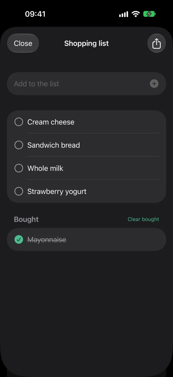 Shopping list with pending items and one already bought
